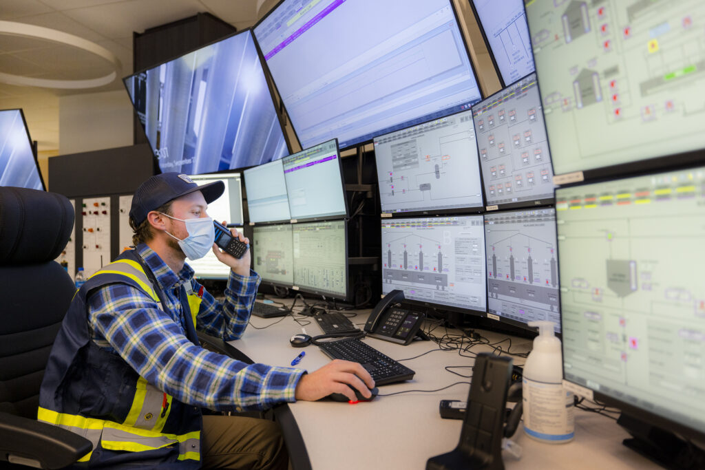 HPC worker looking at screens